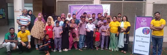 Parents and caregivers cheering athletes at a local competition